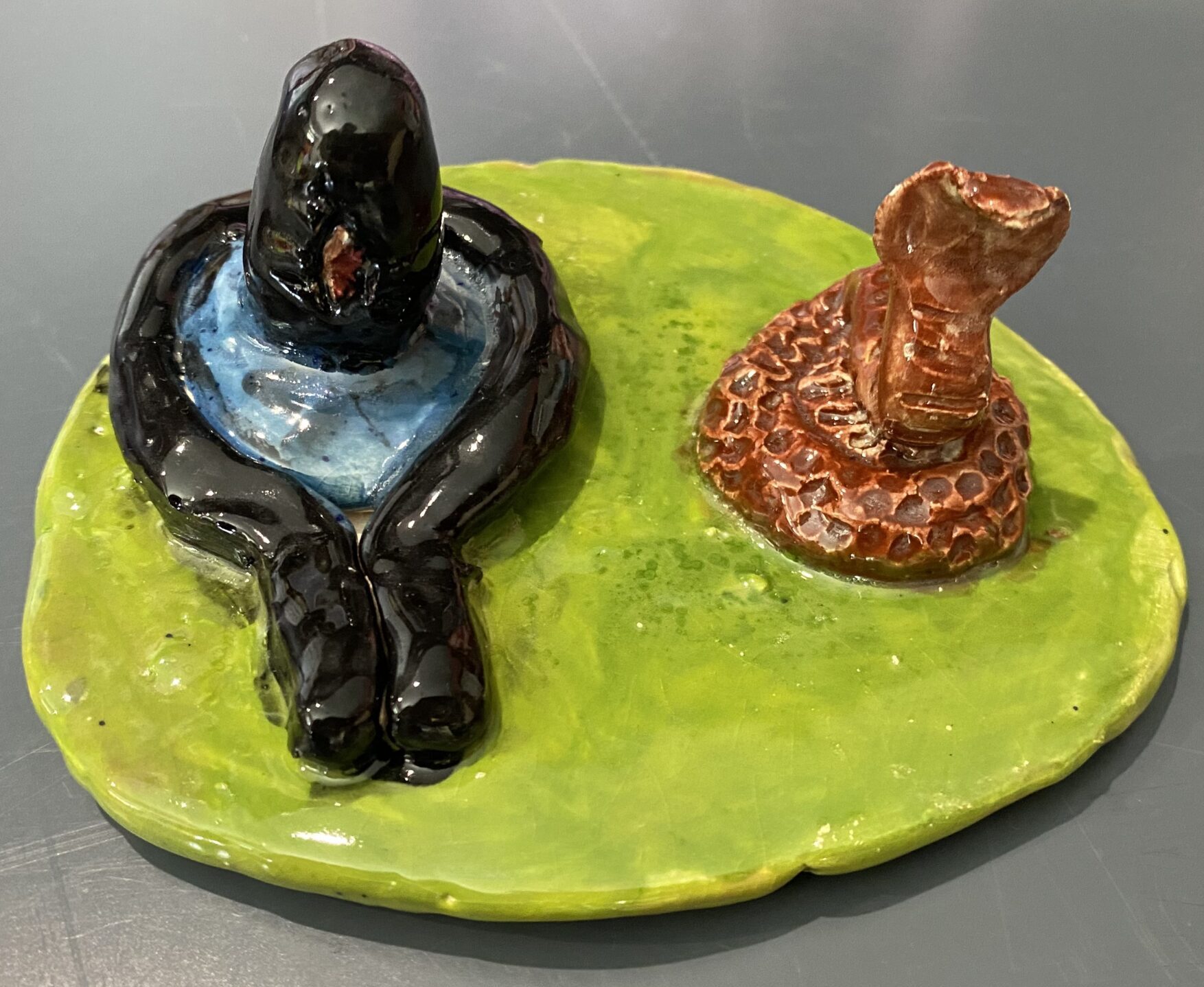 Children engaging in wheel throwing pottery techniques during summer camp at Nilis Art Studio, 78613.