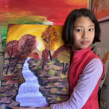 Kids creating colorful paintings at Nilis Summer Art Camp in Cedar Park, enjoying hands-on art activities.